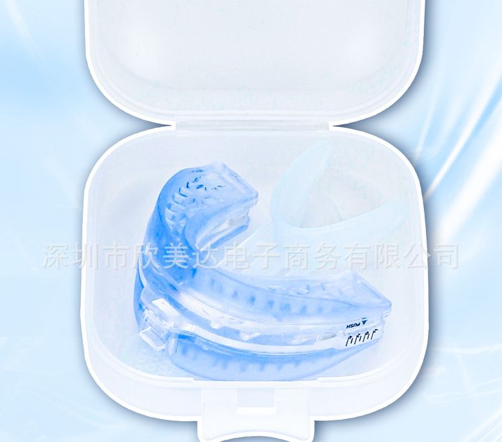 Blue adjustable mouthpiece inside its clear hinged storage case.